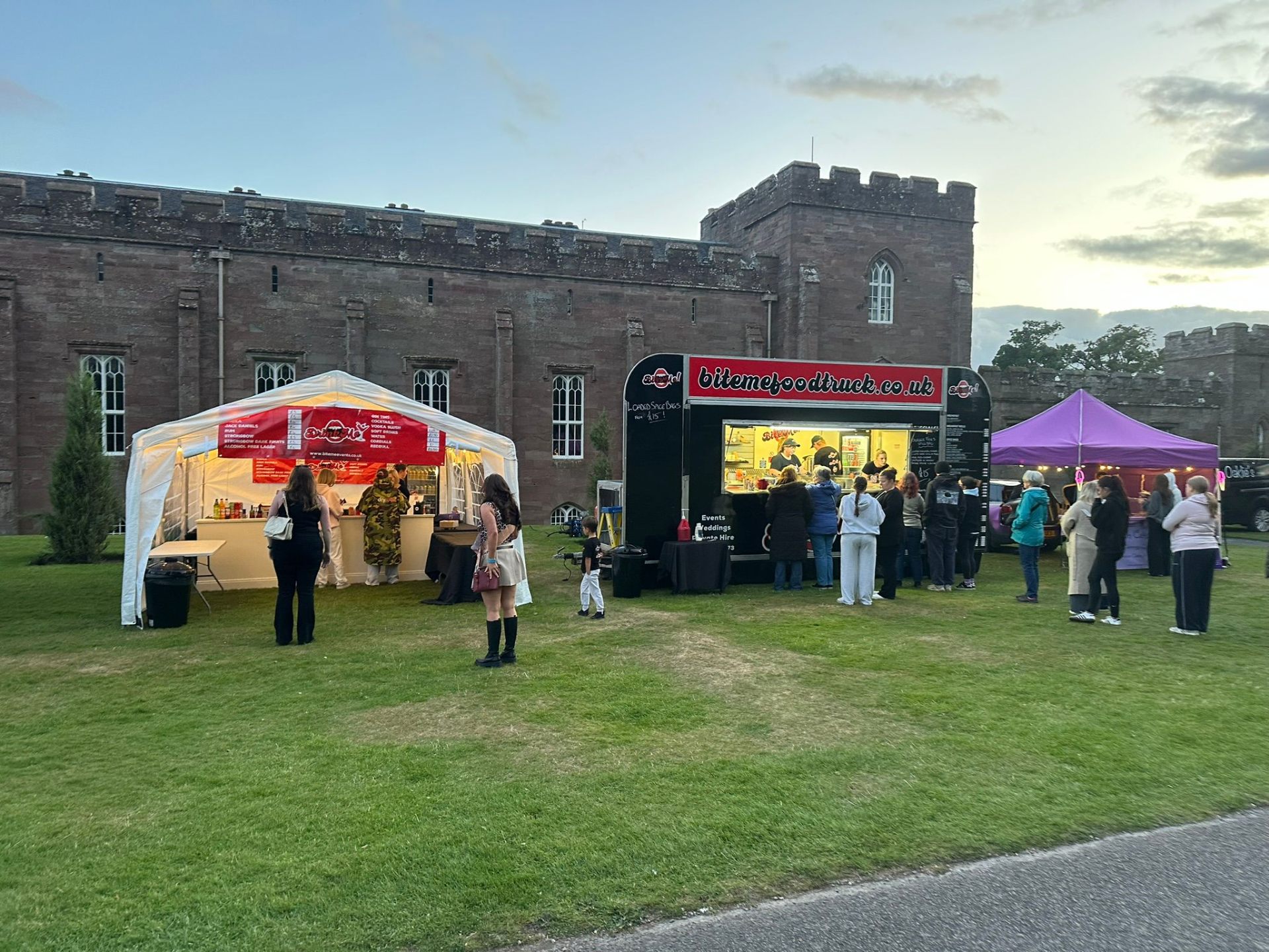 Full Bite Me setup with food truck and bar at castle venue