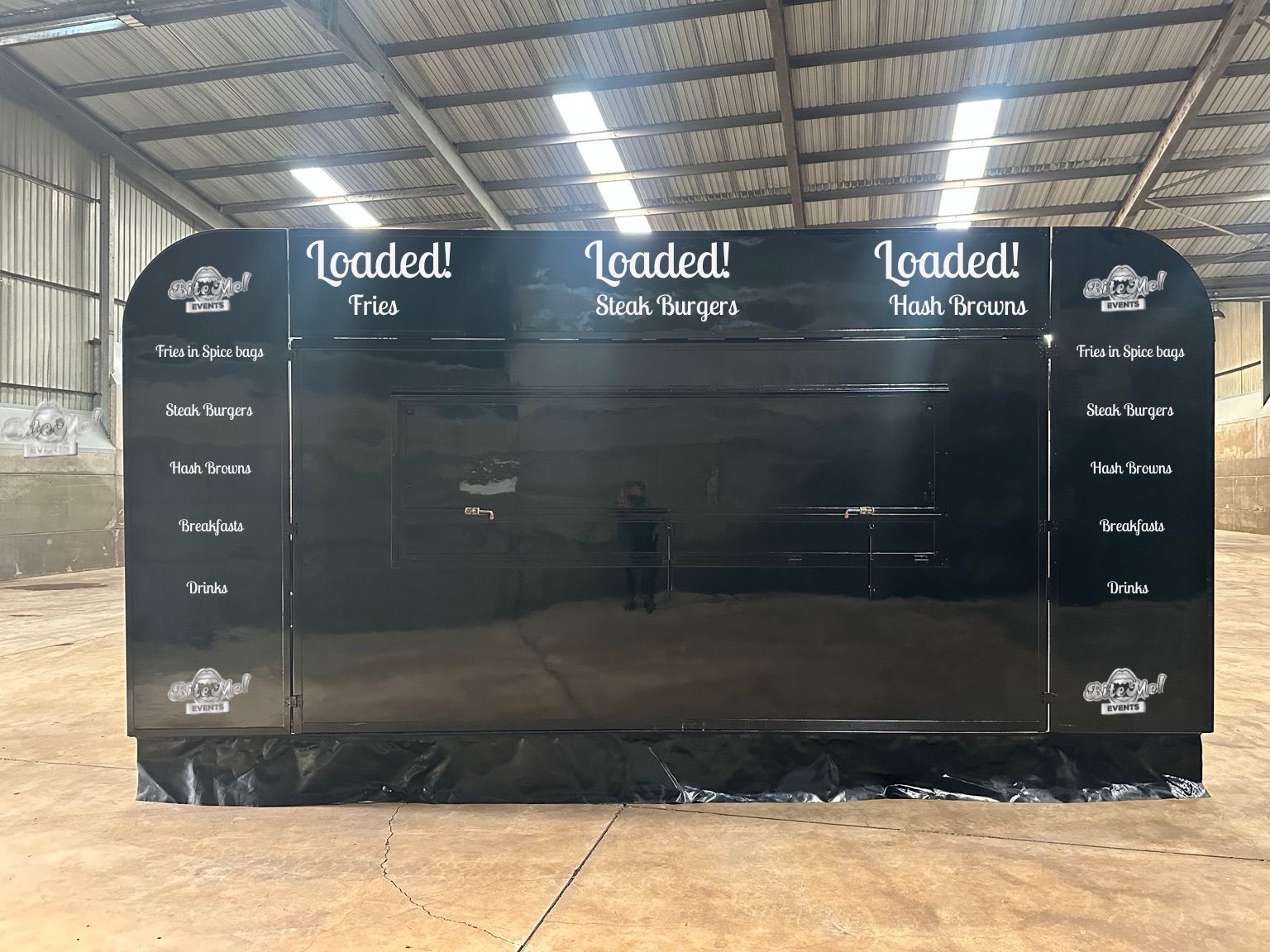 Bite Me Loaded food truck with menu board